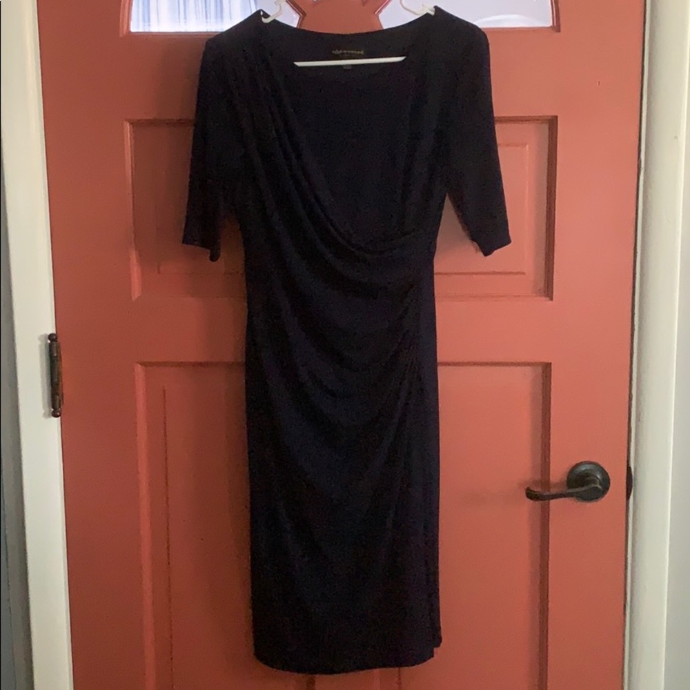 Navy blue dress with ruched waist.